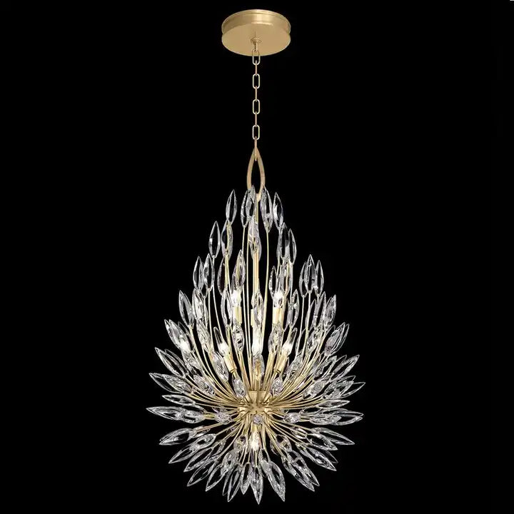 Pendant in gold leaf finish with graceful bouquets of faceted crystal that create a naturally elegant lighting effect. 2022336A